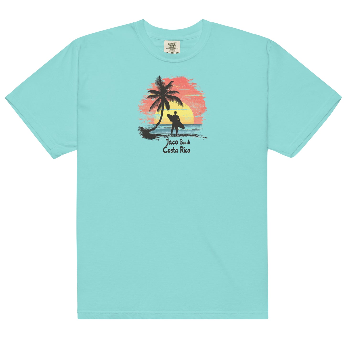 Green T Shirt Silhouette of a surfer with a board standing by a palm tree, Jaco Beach Costa Rica sunset in the background, ocean waves and beach scene.