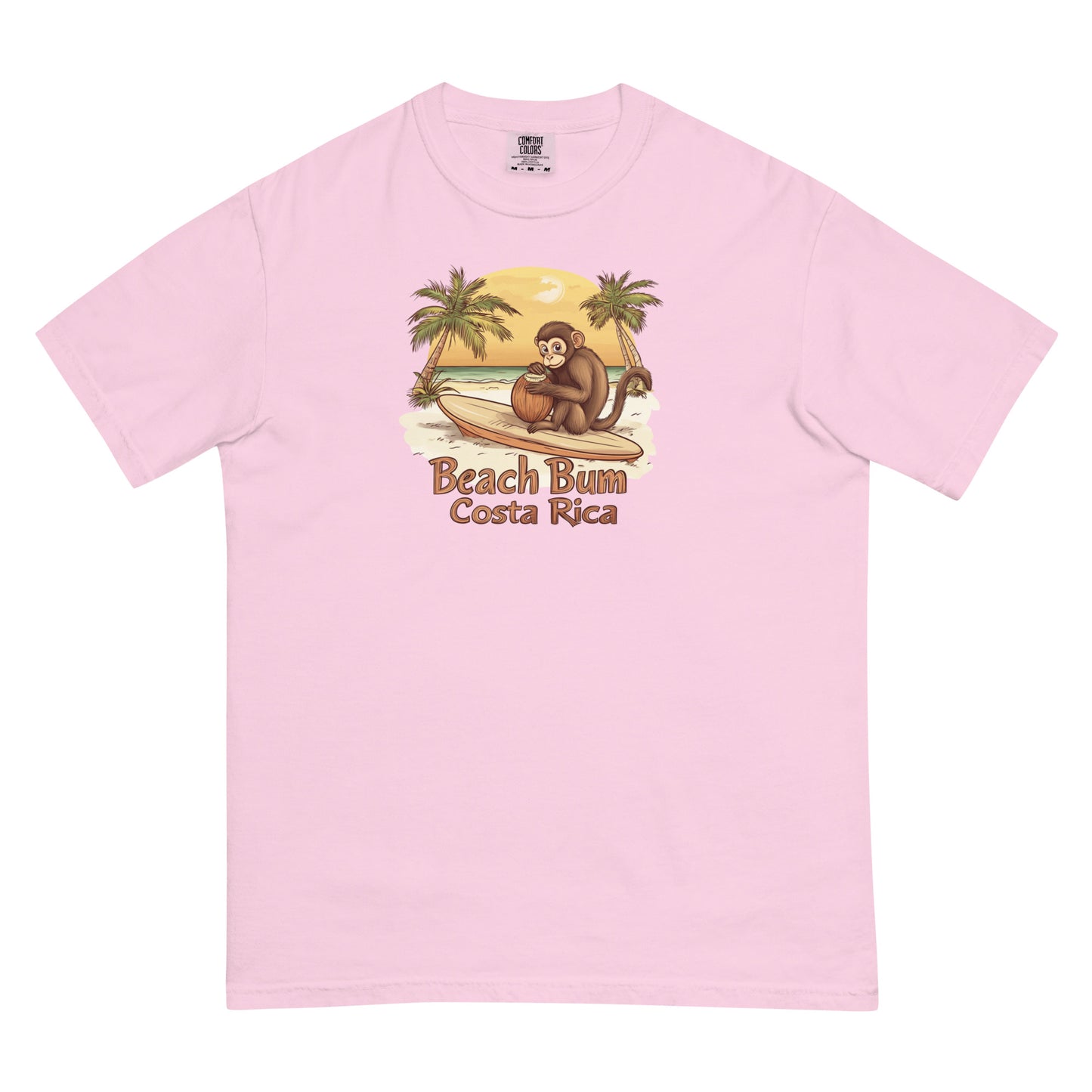 Pink T Shirt Cartoon capuchin monkey sitting on a surfboard, holding a coconut, with palm trees and a sunset on a Costa Rica beach, 'Beach Bum Costa Rica'