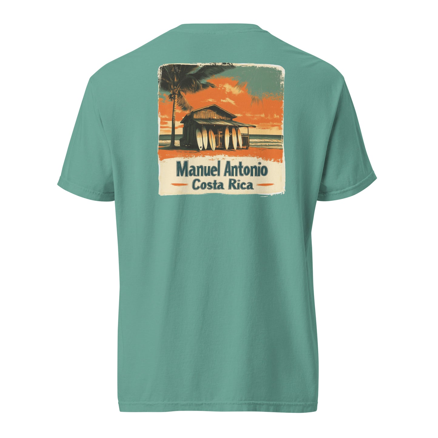 Green Vintage Manuel Antonio Costa Rica t-shirt design featuring a surf shack with surfboards and palm trees at sunset.