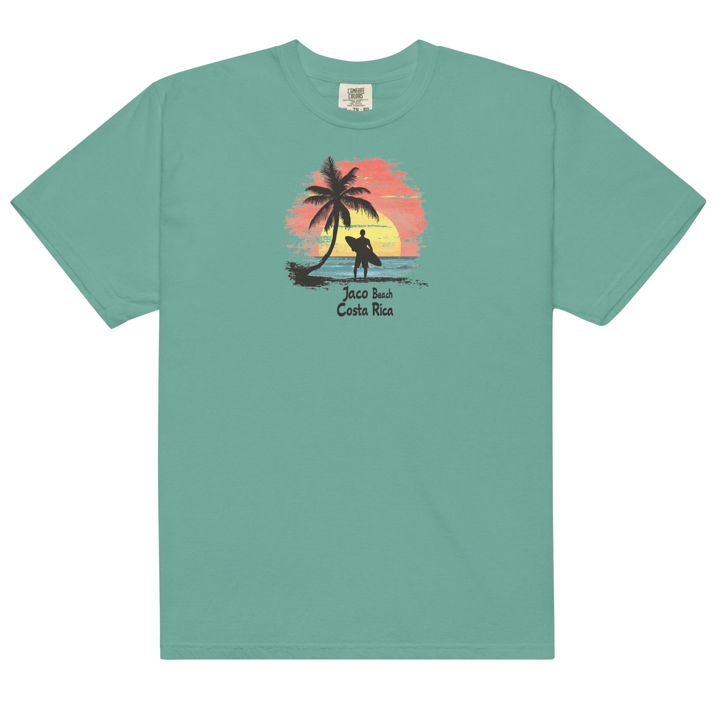 Green T Shirt Silhouette of a surfer with a board standing by a palm tree, Jaco Beach Costa Rica sunset in the background, ocean waves and beach scene.